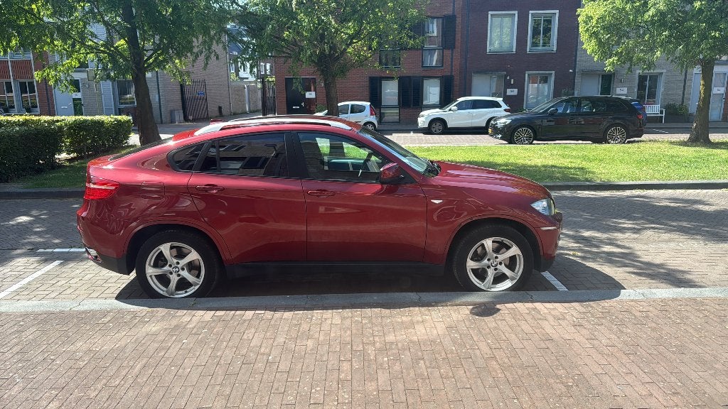BMW X6 3.5 I Xdrive 35I AUT 2009 Rood, Zwart, Vierwielaandrijving, Particulier, SUV of Terreinwagen