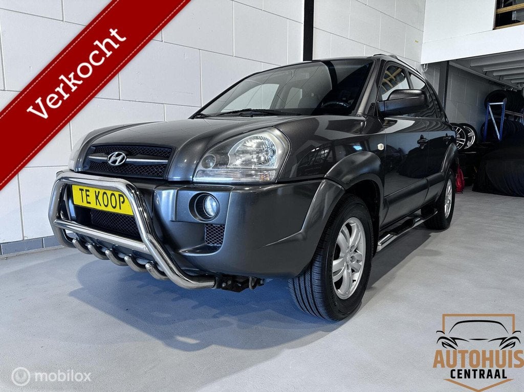 Hyundai Tucson 2.0i Dynamic Cross*Airco*NwAPK, Stof, Gebruikt, Zwart, 4 cilinders