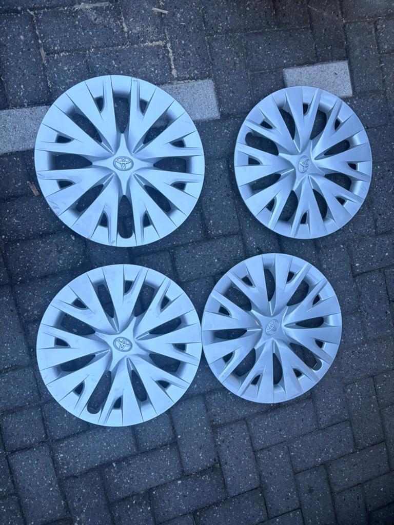 Toyota wieldoppen 15inch set (4 stuks), Ophalen of Verzenden, Gebruikt