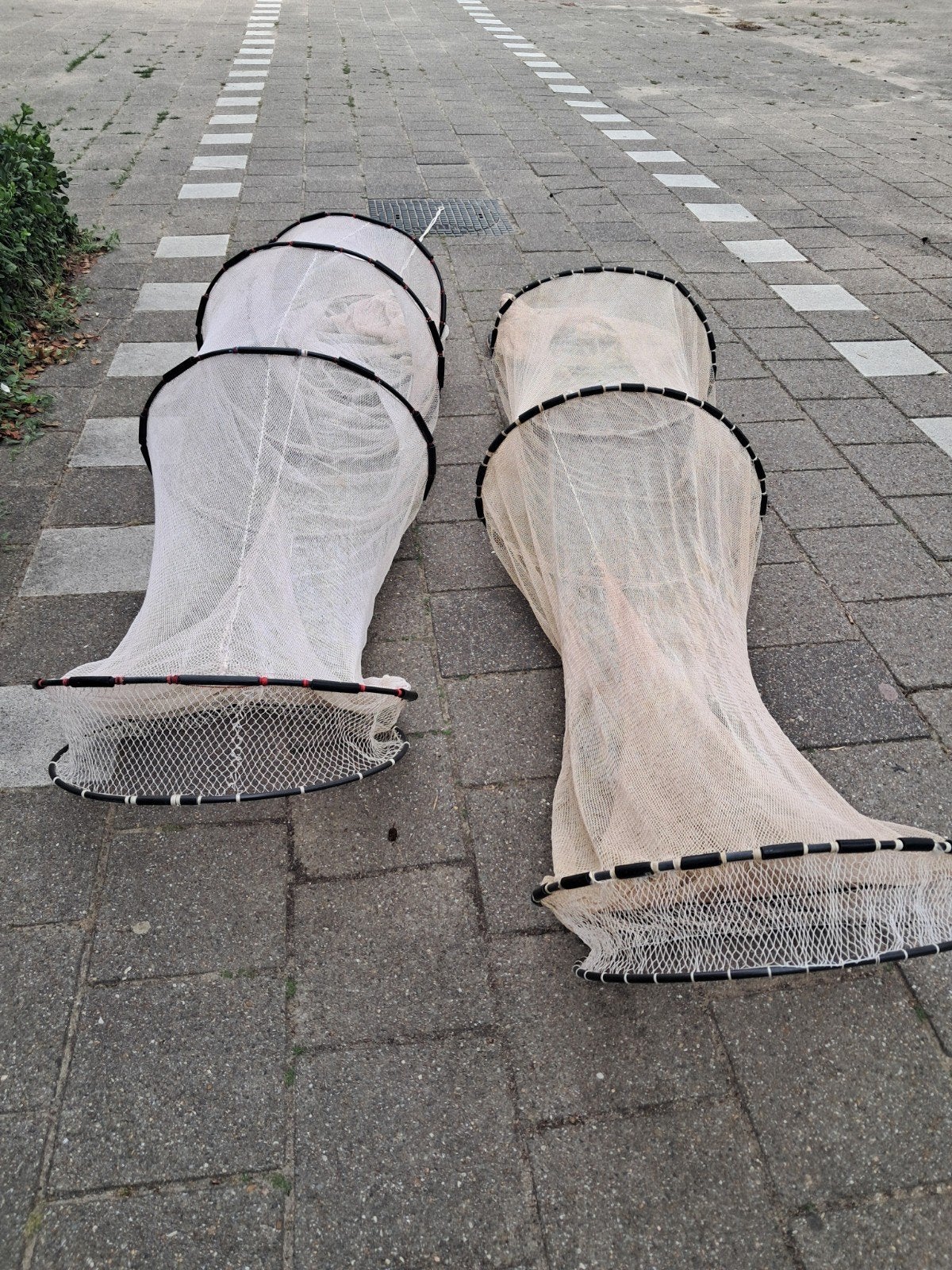 vis fuiken, Ophalen, Net of Fuik