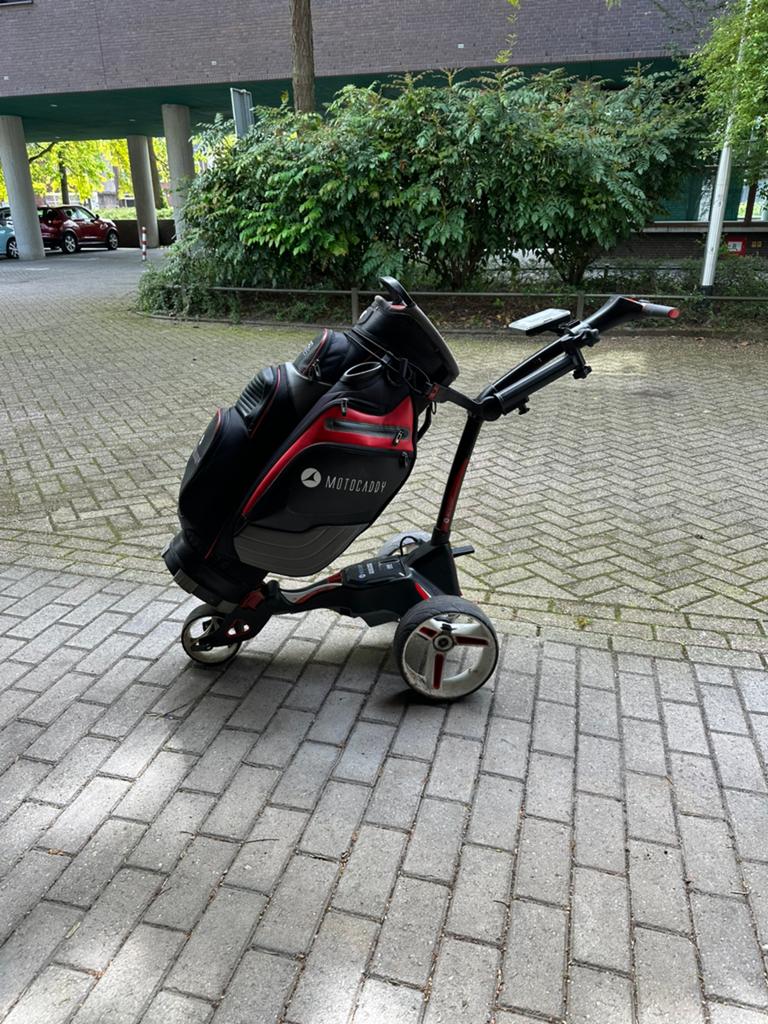 Elektrische golftrolley Motocaddy + luxe Pro Series cartbag, Gebruikt, Golfkar, Ophalen, Overige merken