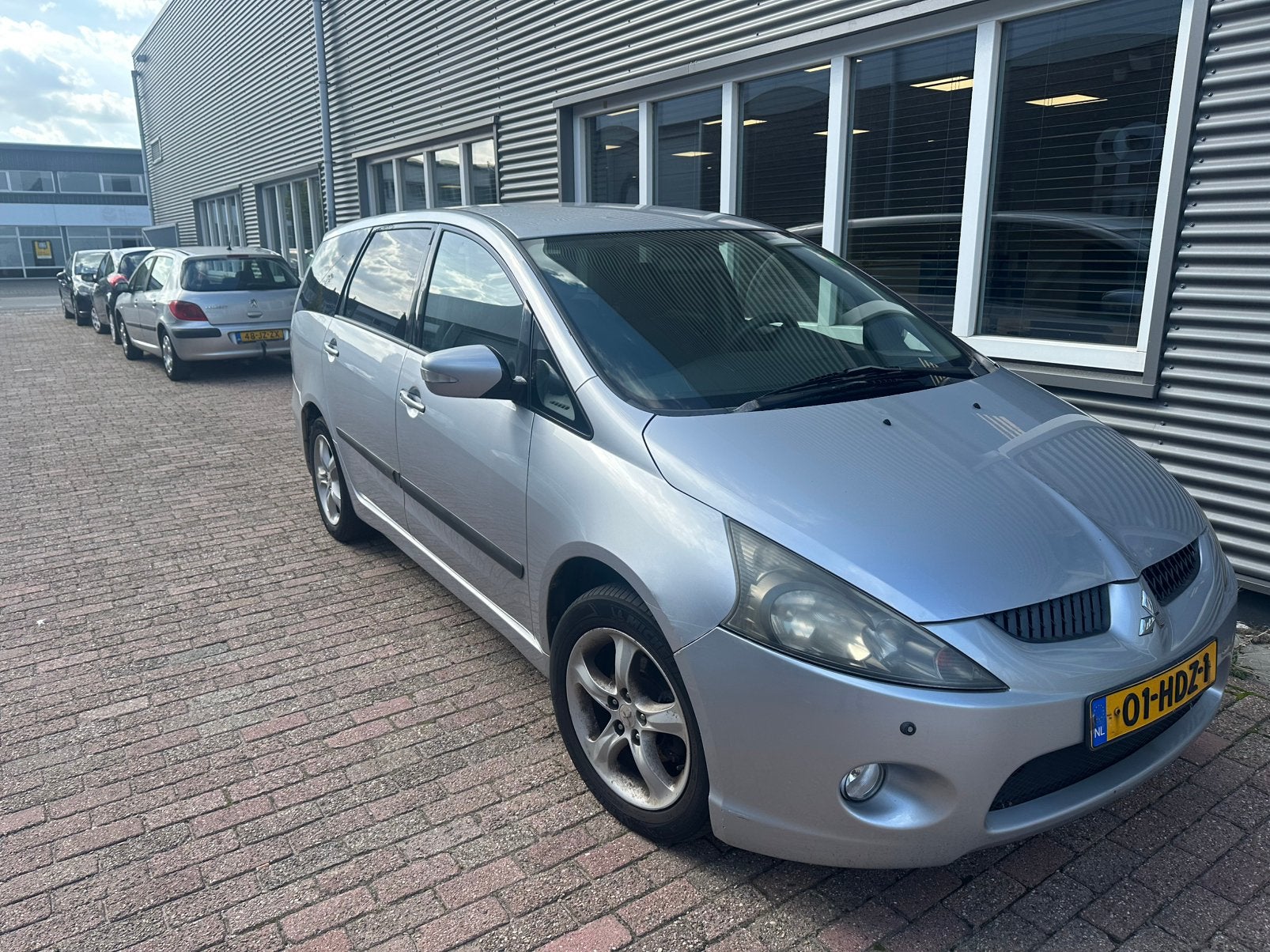 Mitsubishi Grandis 2.4 Automaat 7-Zits | Navi | pdc, Auto's, Stof, Zwart, 7 stoelen, 10 km/l
