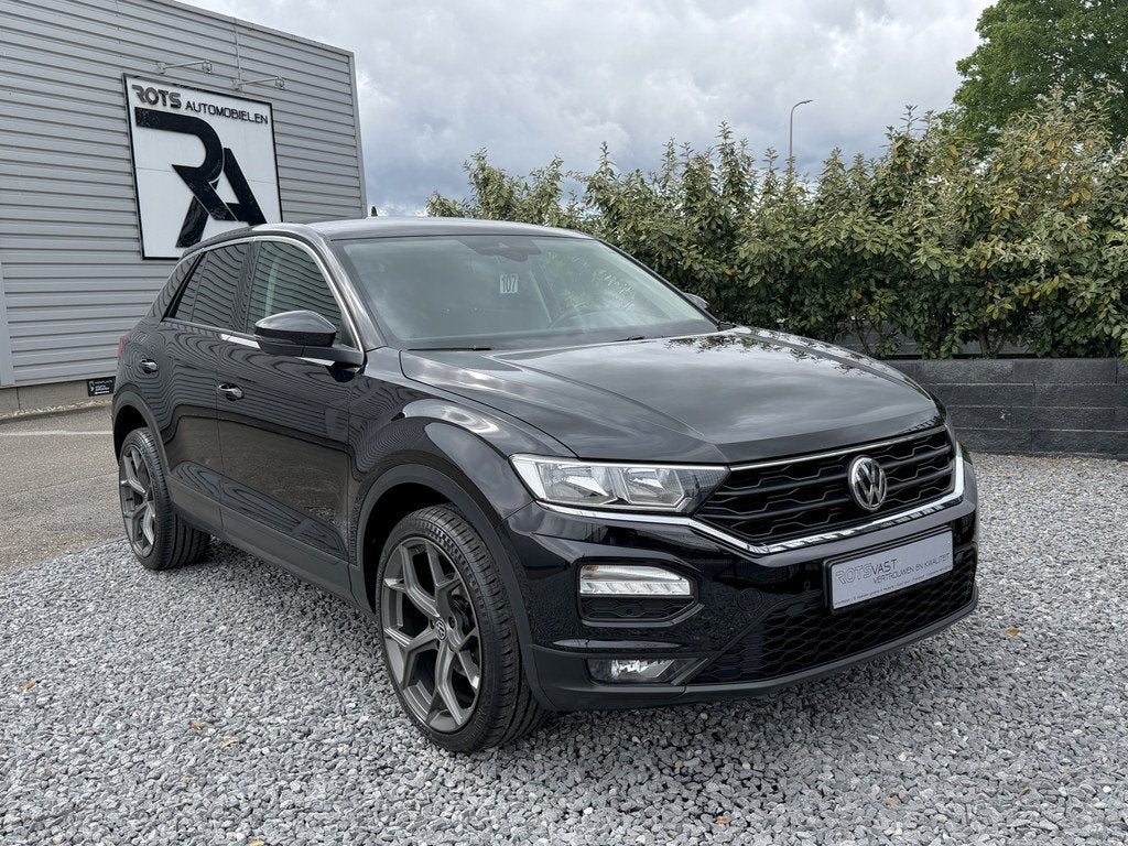 Volkswagen T-Roc 1.0 TSI Style Navi|Media|PDC|Lineast Zwart, Voorwielaandrijving, Stof, Gebruikt, Met garantie (alle)