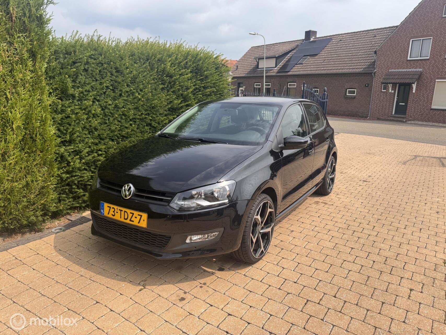 Volkswagen Polo 1.2 TSI Comfortline MET NIEUWE DISTRIBUTIE, Euro 5, Stof, Zwart, 4 cilinders