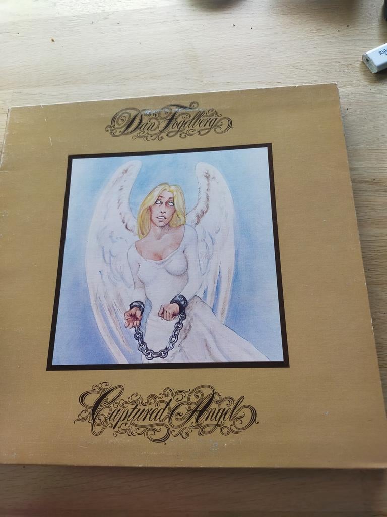 Dan Fogelberg , captured angel, Ophalen of Verzenden, Zo goed als nieuw, 12 inch, Poprock