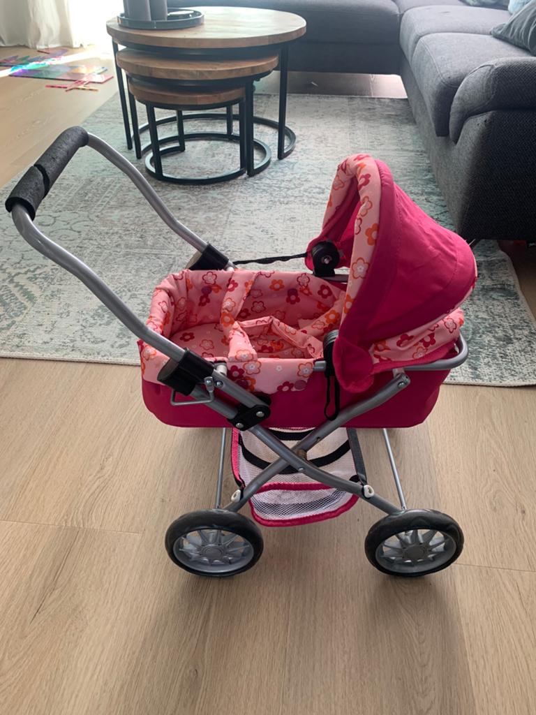 Roze poppenwagen inklapbaar, Kinderen en Baby's, Speelgoed | Poppen, Ophalen of Verzenden, Zo goed als nieuw, Babypop
