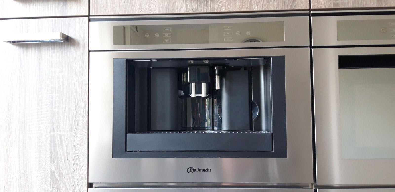Inbouw koffiemachine Bauknecht, Ophalen