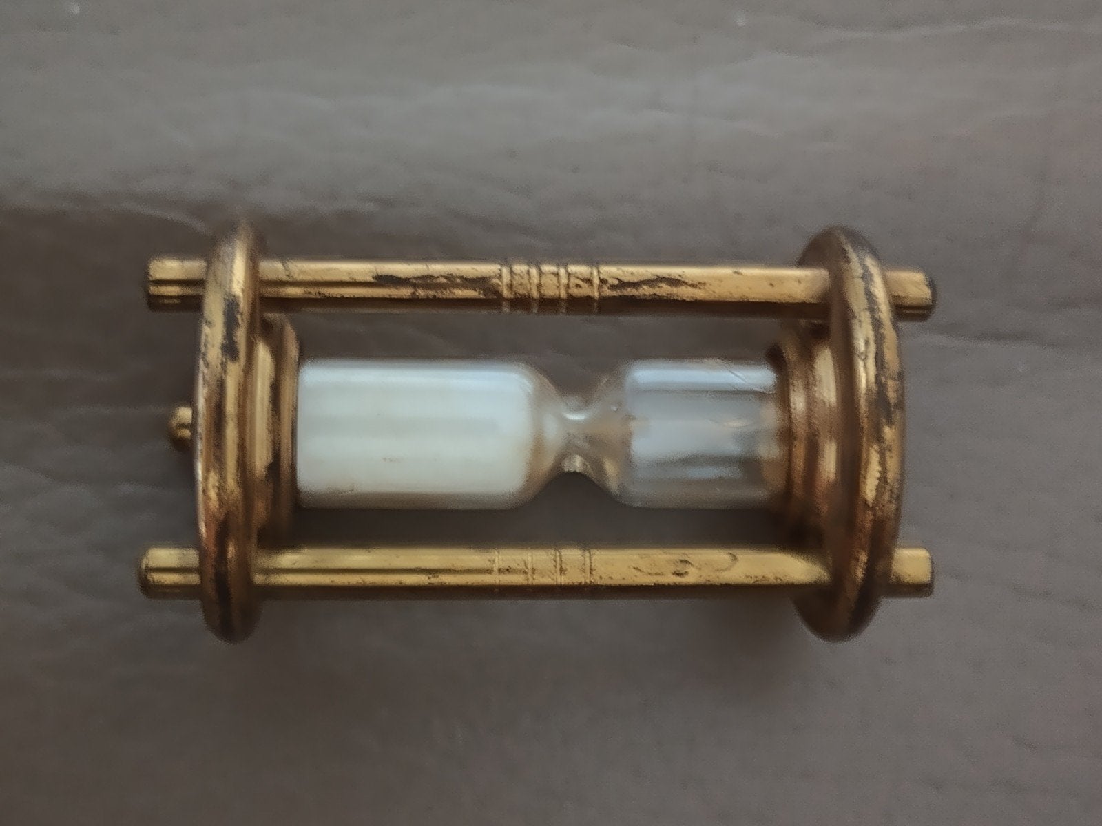 Antieke zandloper in messing frame, Ophalen of Verzenden