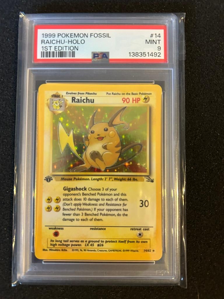 14/62 fossil raichu 1st psa 9, Ophalen of Verzenden, Zo goed als nieuw, Foil