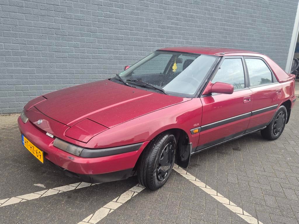 Mazda 323 1.6 I F GLX 16V AUT U9 1994 Rood, Auto's, Mazda, Stof, 4 cilinders, 400 kg, Origineel Nederlands