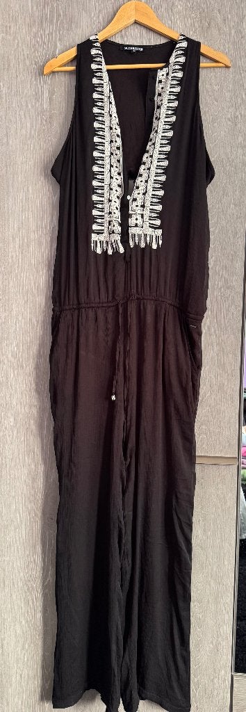 Zgan exclusieve jumpsuit superstar, Zwart, Maat 42/44 (L), Ophalen of Verzenden, Zo goed als nieuw