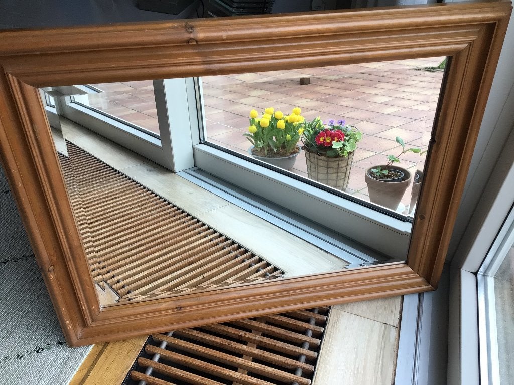 Eikenhouten spiegel, Ophalen