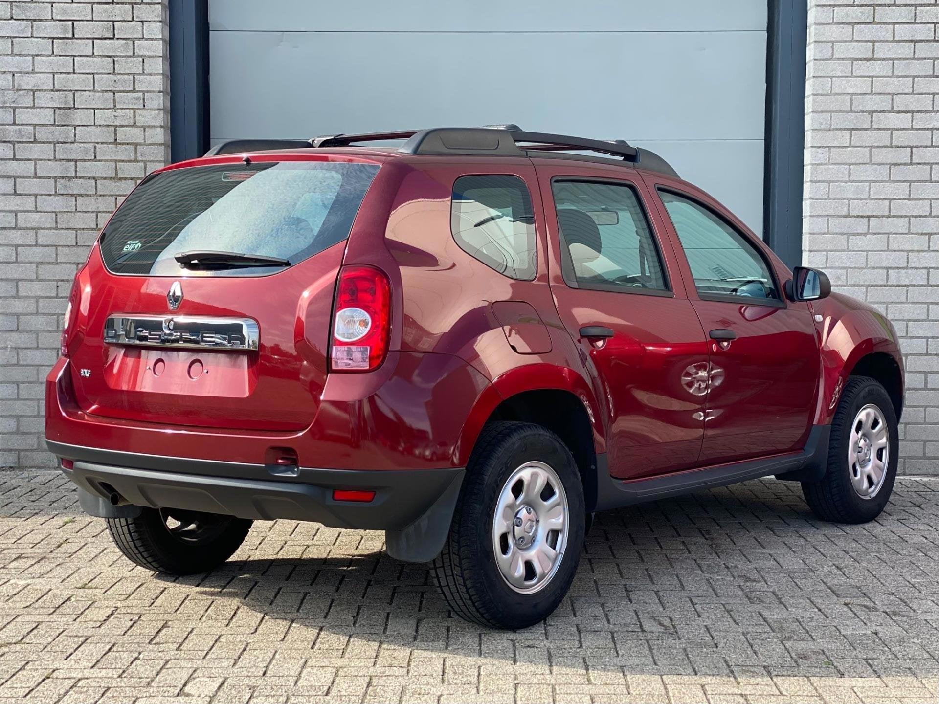 Dacia Duster 1.6 SCe 4x2 *EXPORT* 11.000KM, Voorwielaandrijving, Stof, Gebruikt, Duster