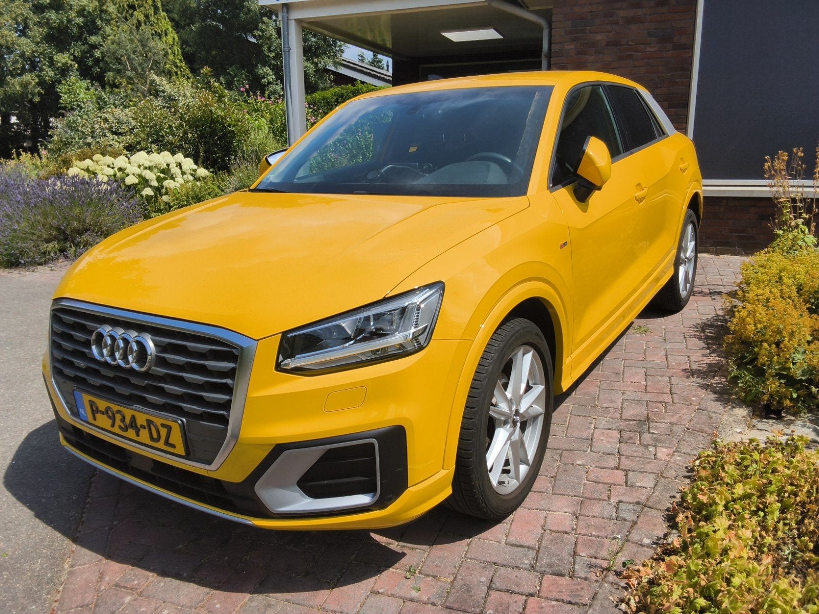 Audi Q2 35 Tfsi 150pk S Tronic 2019 Geel  54000 km automaat, Auto's, 1498 cc, 4 cilinders, Geel, Geïmporteerd
