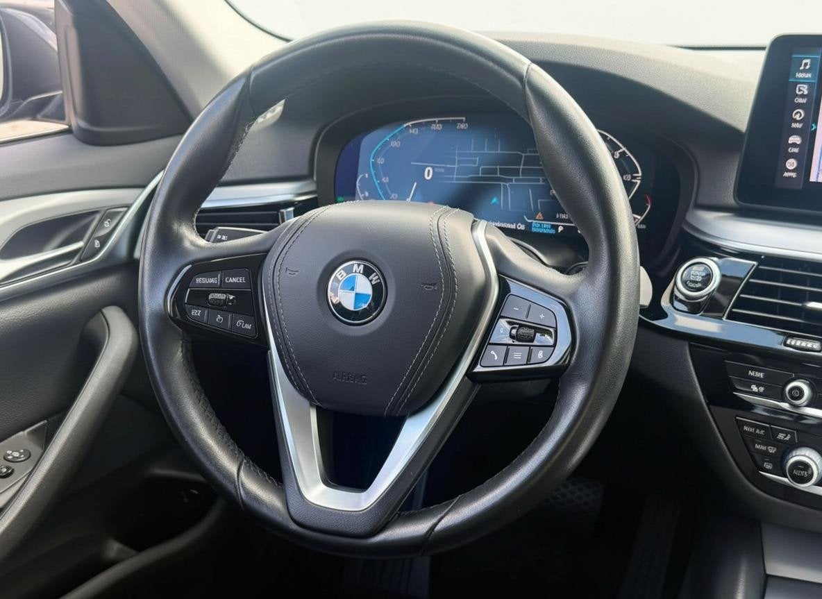 Foto 12 van BMW 5-serie Touring 520i High Executive
