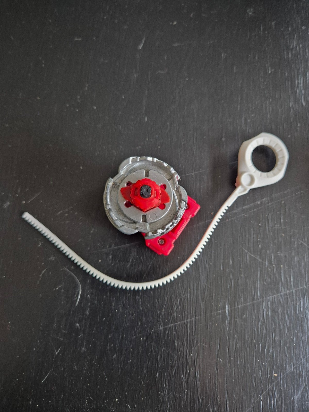 Beyblade met launcher - Rood en Zilver, Kinderen en Baby's, Speelgoed | Overig, Ophalen of Verzenden, Gebruikt, Jongen of Meisje