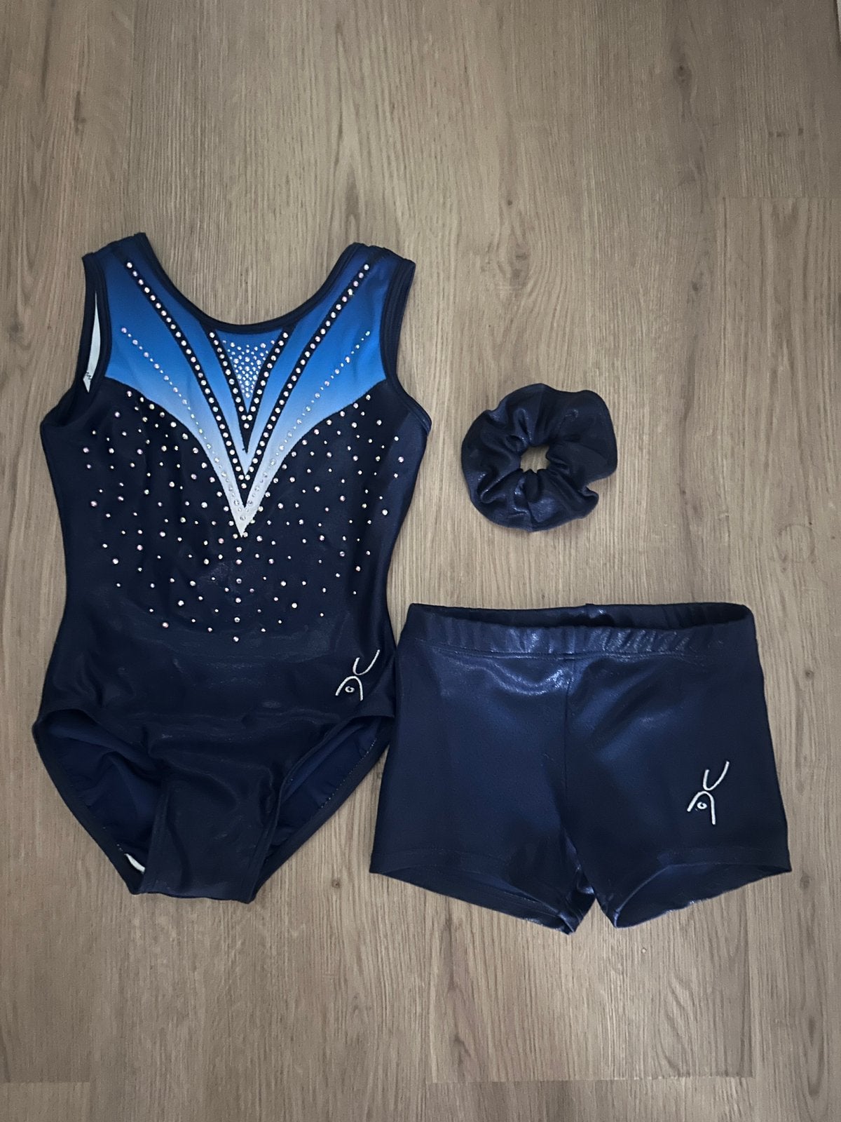 Turnpakje met broekje en wokkel 128, Sport en Fitness, Turnen, Blauw, Zo goed als nieuw, Turnpak(je), Kindermaat 122 t/m 140