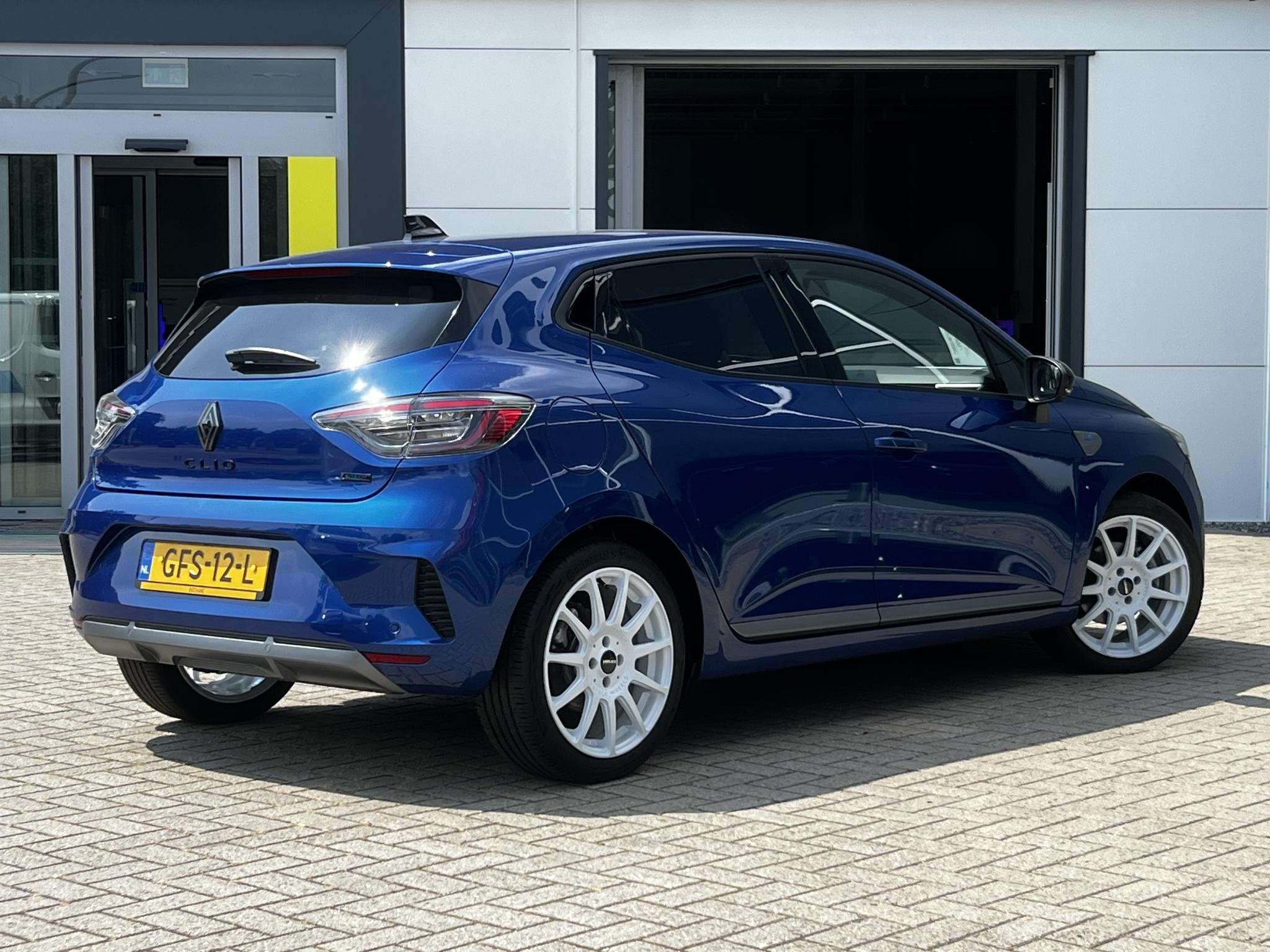 Renault Clio 1.6 E-Tech Full Hybrid 145 esprit Alpine | 360, Gebruikt, Met garantie (alle), Blauw, Leder en Stof