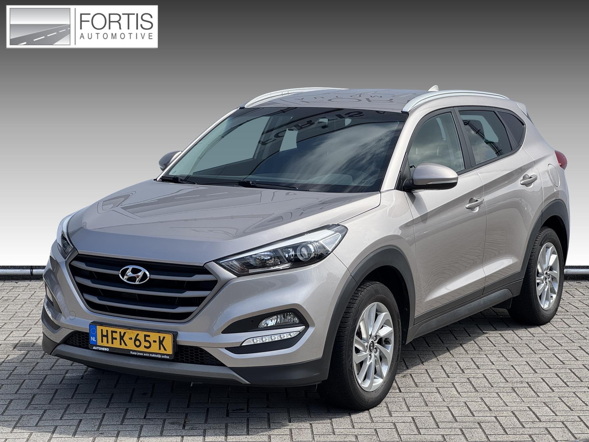 Hyundai Tucson 1.6 T-GDi Comfort 4WD PARKEERCAMERA | NAVI |, Stof, Gebruikt, 4 cilinders, Vierwielaandrijving
