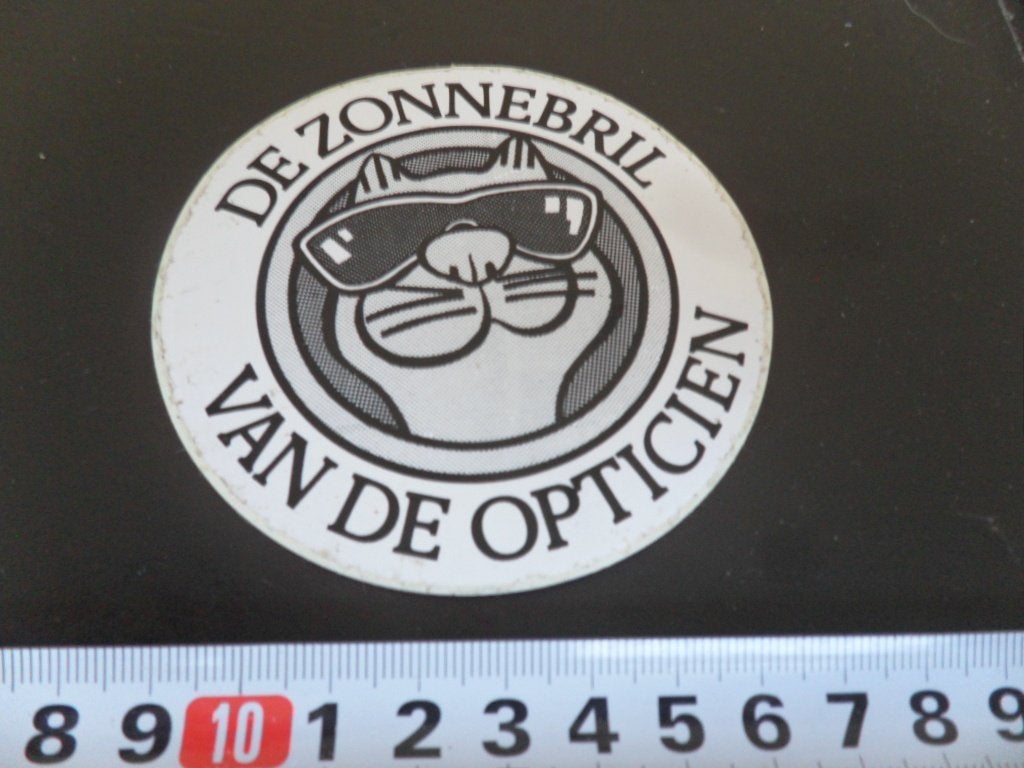 sticker DE ZONNEBRIL van de Opticien, Ophalen of Verzenden, Zo goed als nieuw