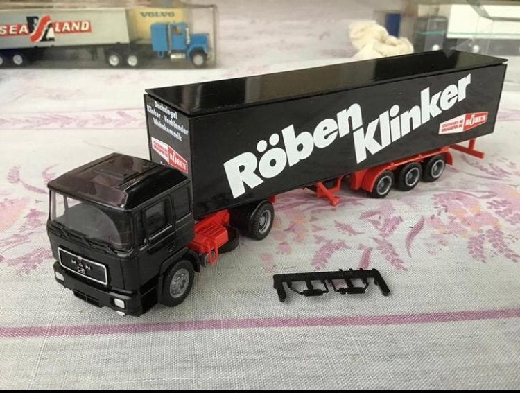 M.A.N. Truck en trailer van Herpa, Hobby en Vrije tijd, Modelauto's | 1:87, Ophalen of Verzenden, Zo goed als nieuw, Bus of Vrachtwagen