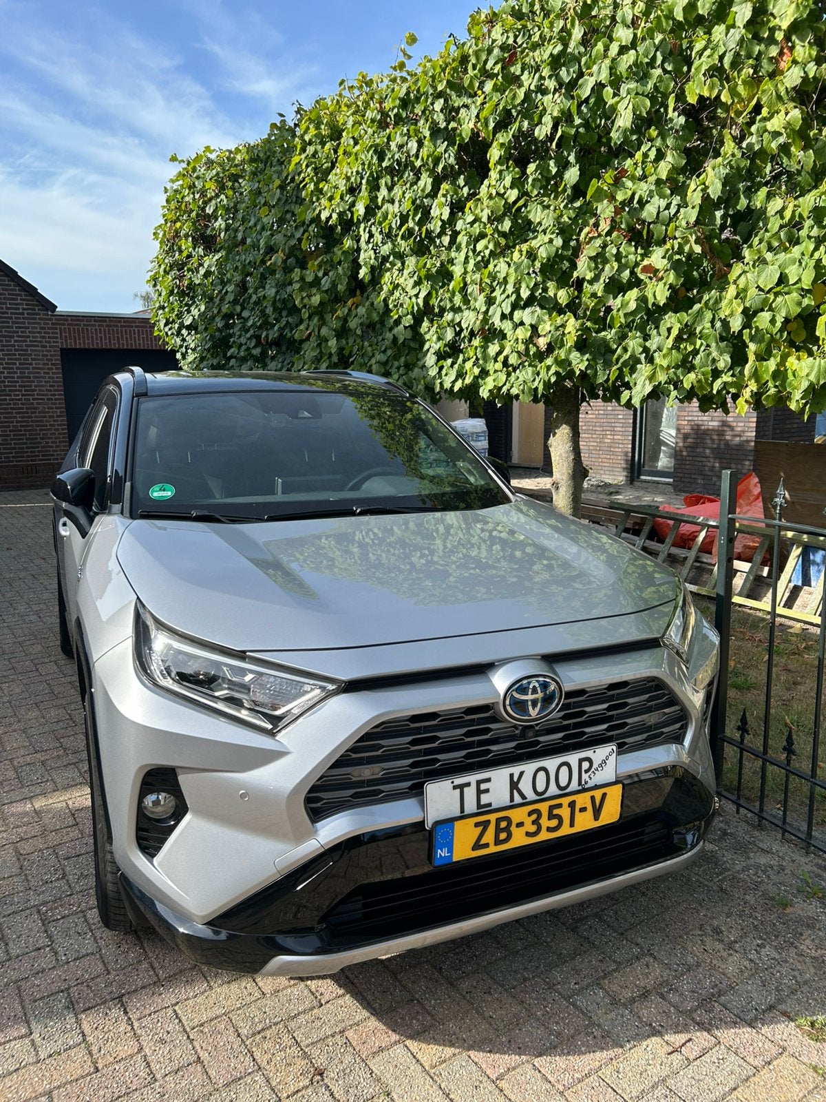 Toyota Rav4 2.5 Hybrid 218pk CVT 2019 Grijs, Auto's, Toyota, 4 cilinders, 2487 cc, 1650 kg, Origineel Nederlands