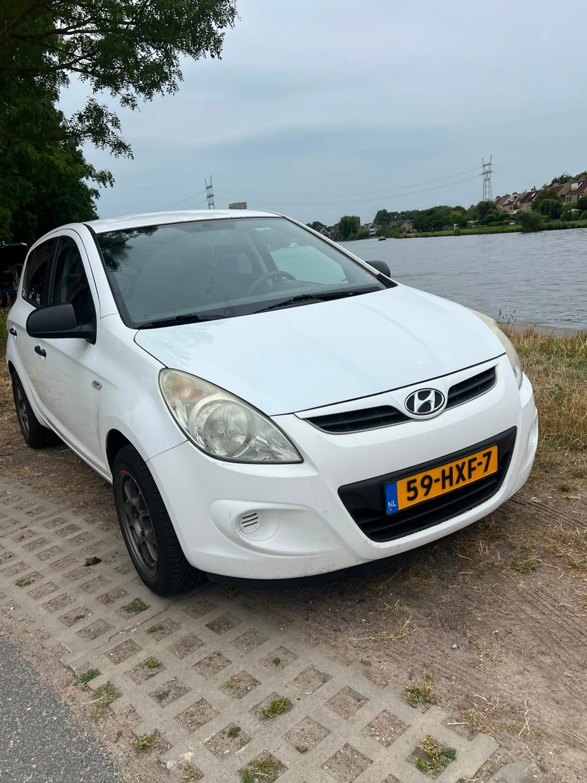 Hyundai i20 1.2 5-DRS 2009 Wit met Carplay en Camera!, Auto's, Hyundai, 945 kg, 4 cilinders, Wit, Origineel Nederlands