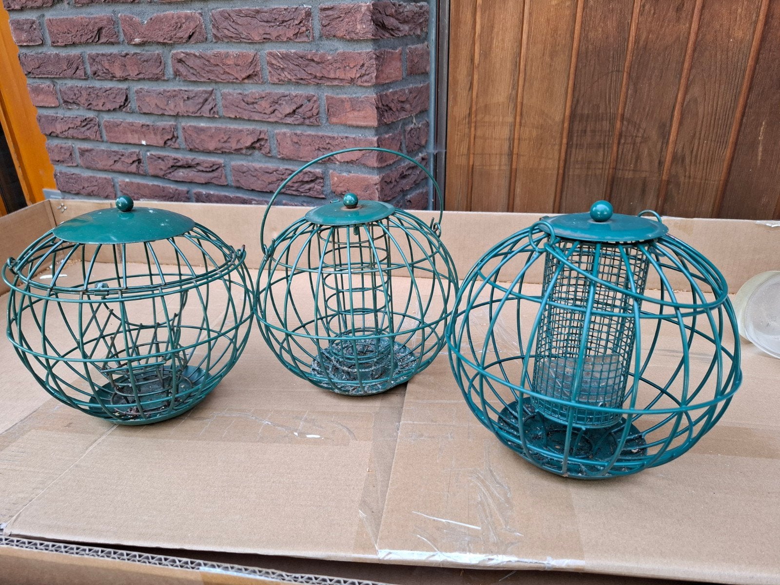 Vogel voederbollen metaal, Ophalen