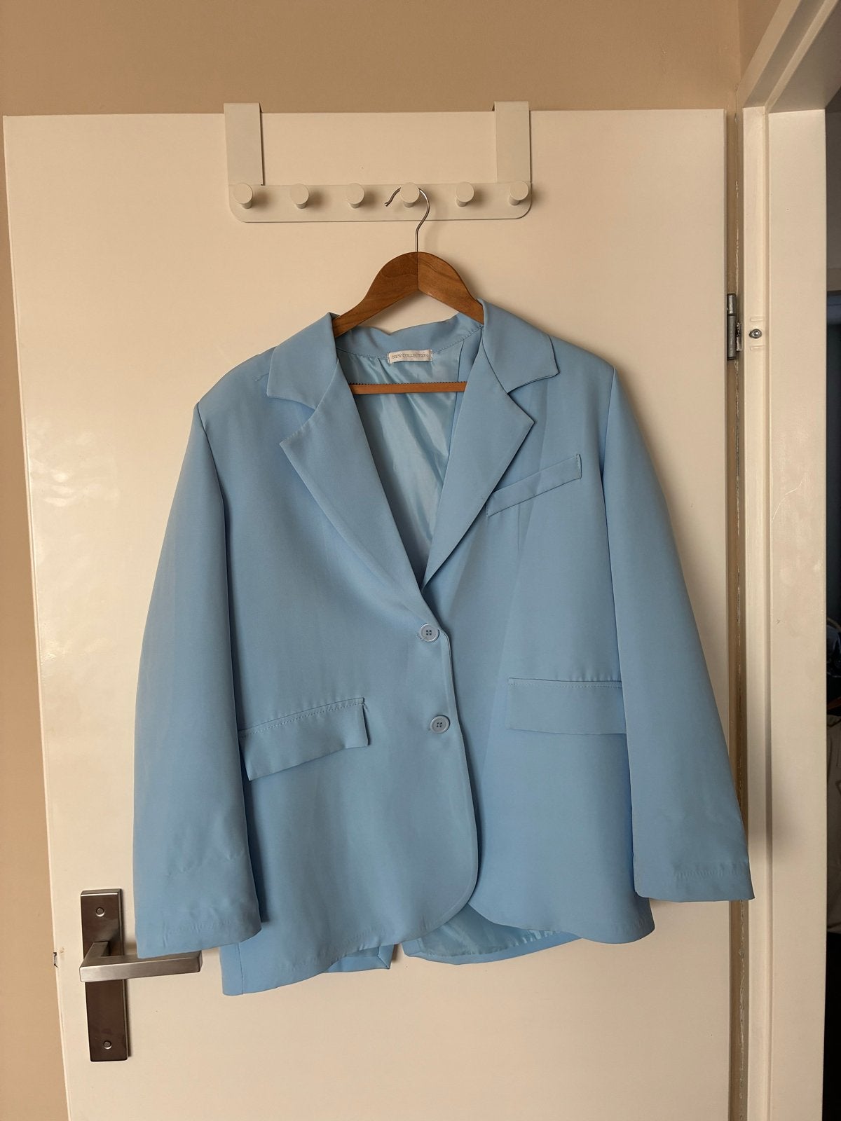 Lichtblauwe blazer met split, maat M. New Collection, Maat 38/40 (M), Blauw, Ophalen of Verzenden, Zo goed als nieuw