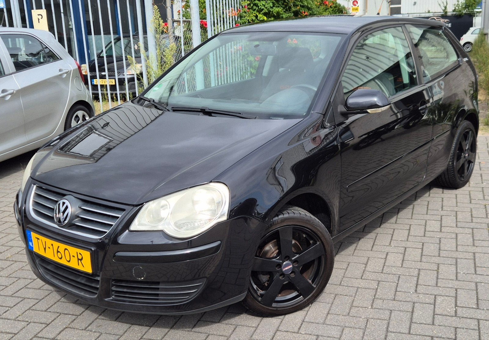 Volkswagen Polo 1.2 40KW 2006 Zwart*Zwarte velgen*, Voorwielaandrijving, 989 kg, 1198 cc, Zwart