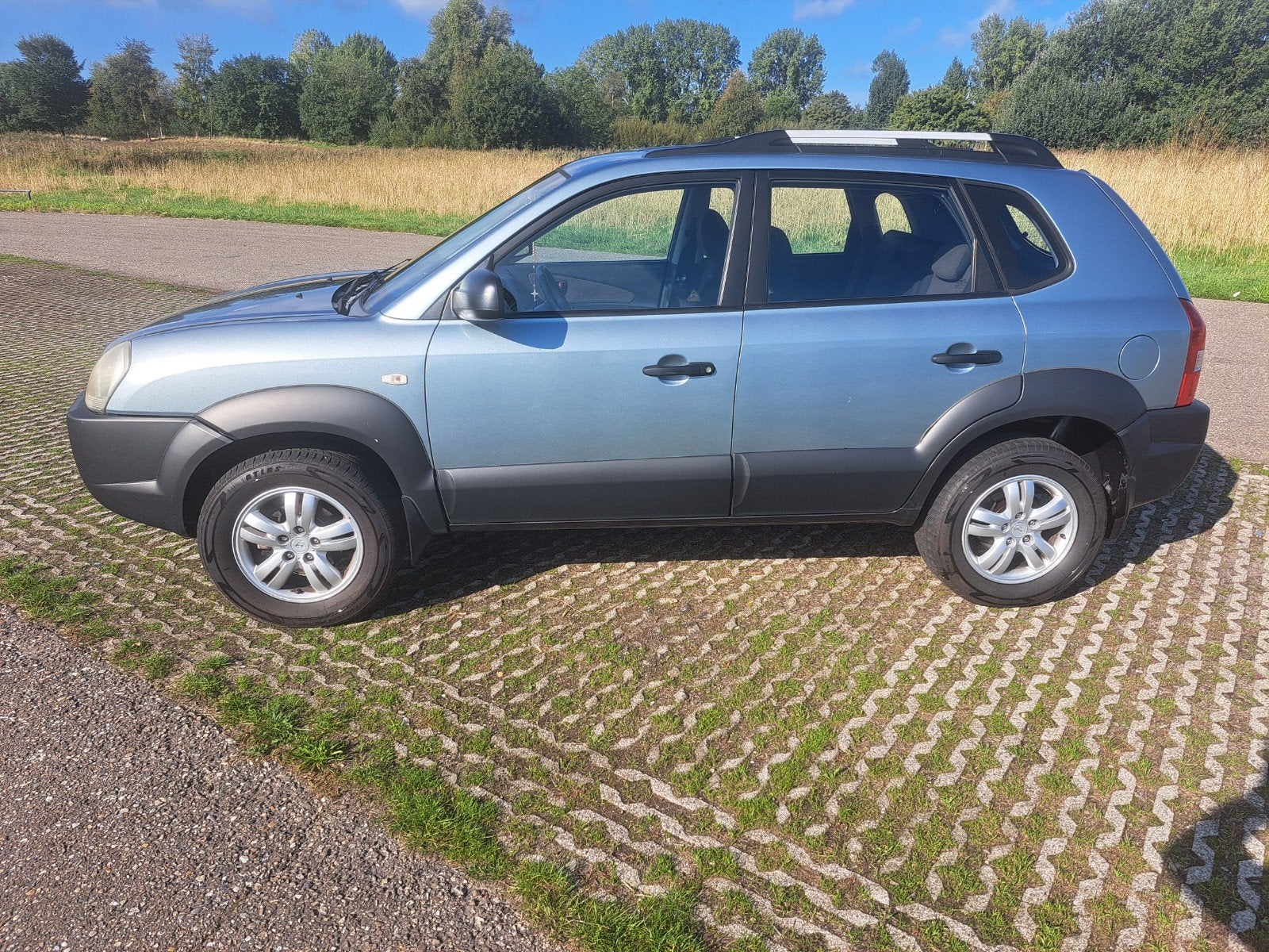 Hyundai Tucson 2.0 I 2WD 2007 Grijs, Auto's, 4 cilinders, Origineel Nederlands, 75 €/maand, Handgeschakeld