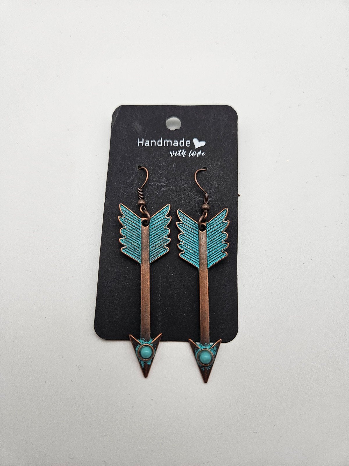Oorbellen met pijl en turquoise details, Overige materialen, Hangers, Nieuw, Ophalen of Verzenden