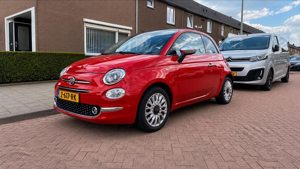 Fiat 500C 1.2 69pk 2015 Rood facelift km stand 89121, Auto's, Achterwielaandrijving, 4 cilinders, Cabriolet, Leder en Stof