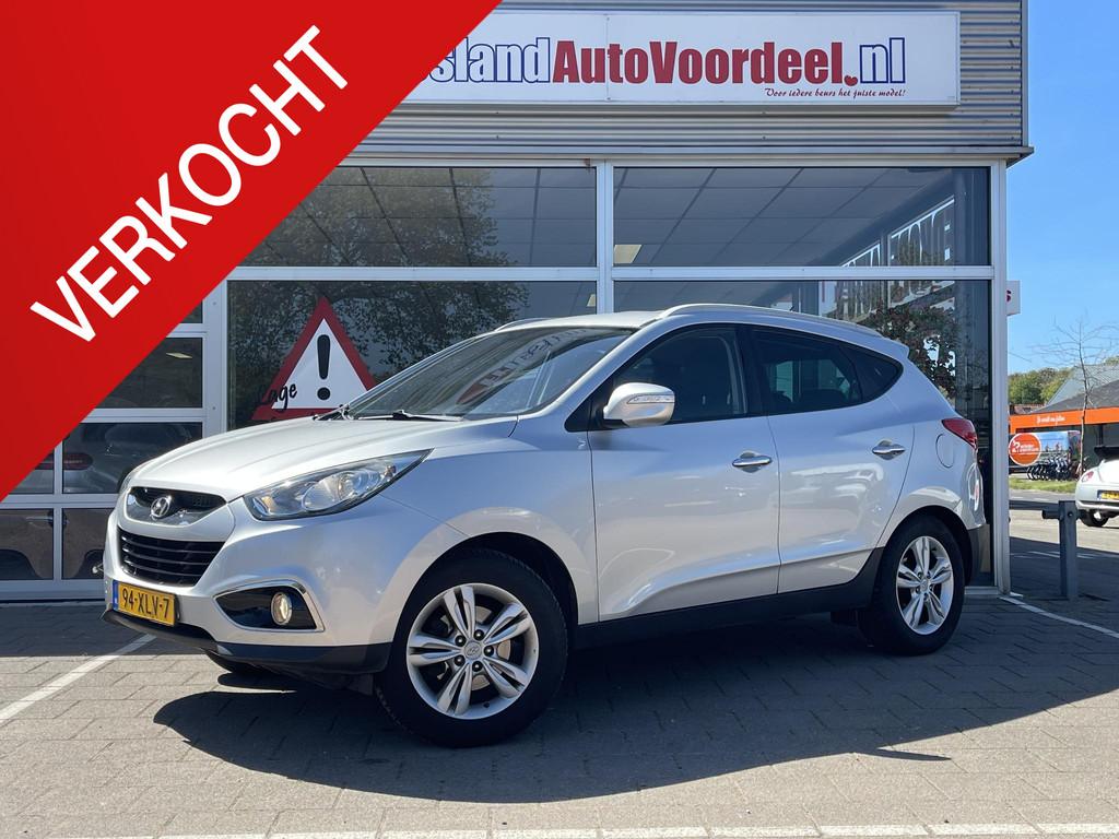 Hyundai ix35 2.0i Style /Clima/Cruise/Trekhaak/PDC achter/on, Gebruikt, 4 cilinders, Met garantie (alle), Leder en Stof