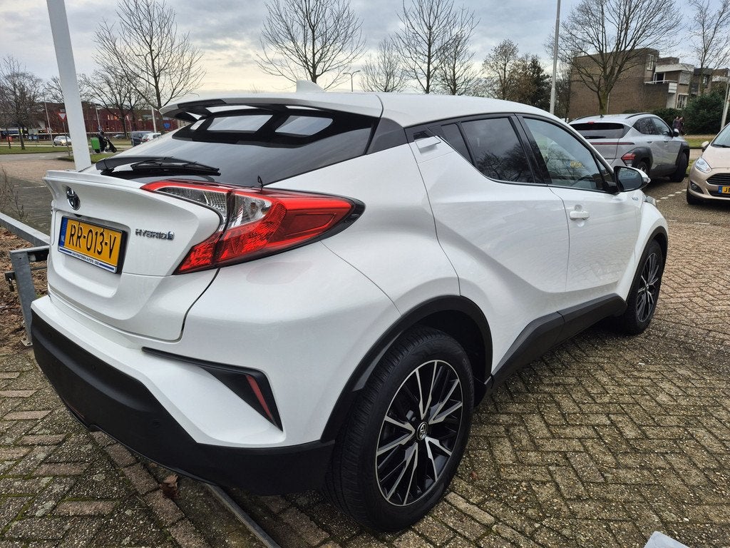 Toyota C-HR 1.8 Hybrid Dynamic (NEDERLANDSE AUTO 1e EIGENAAR, Auto's, 12 maanden, Euro 6, 4 cilinders, Wit