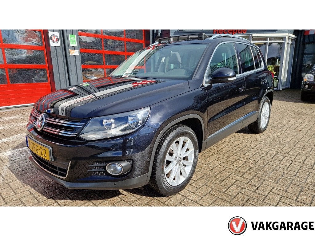 Volkswagen Tiguan 1.4 TSI Sport&Style (bj 2014), Auto's, Voorwielaandrijving, Euro 5, 15 km/l, Gebruikt