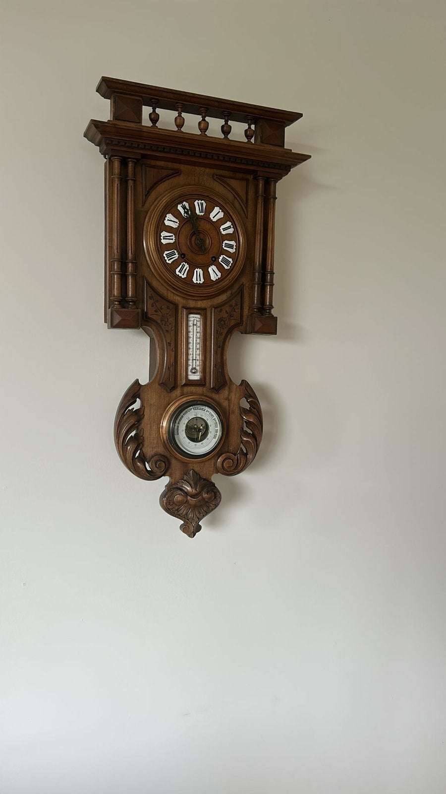 Antieke klok met barometer, Ophalen