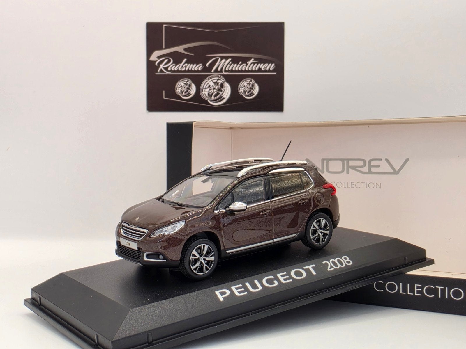Peugeot 2008 2013 Makaha bruin - 1:43 Norev, Auto, Norev, Ophalen of Verzenden, Zo goed als nieuw