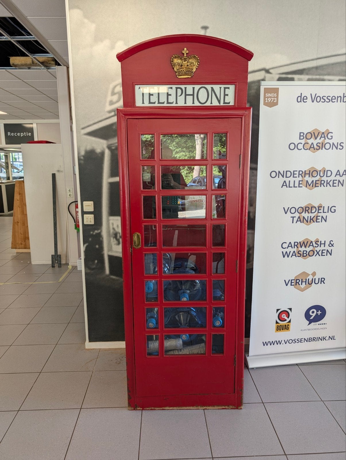 Houten Telefooncel (Opknapper), Ophalen