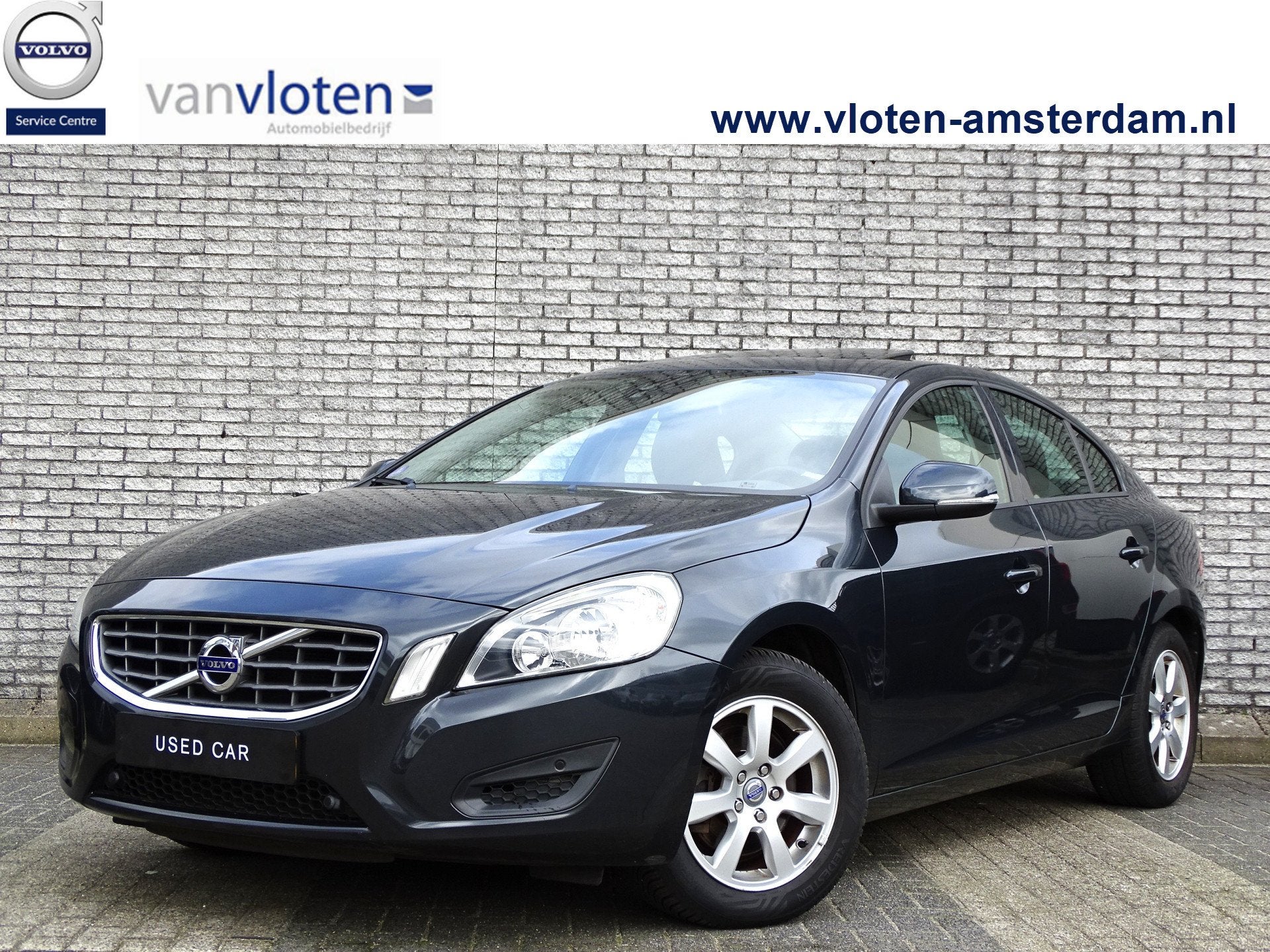 Volvo S60 1.6 T4F Kinetic | Leder | Trekhaak | Schuif- / kan, Auto's, Gebruikt, Zwart, Met garantie (alle), 179 pk