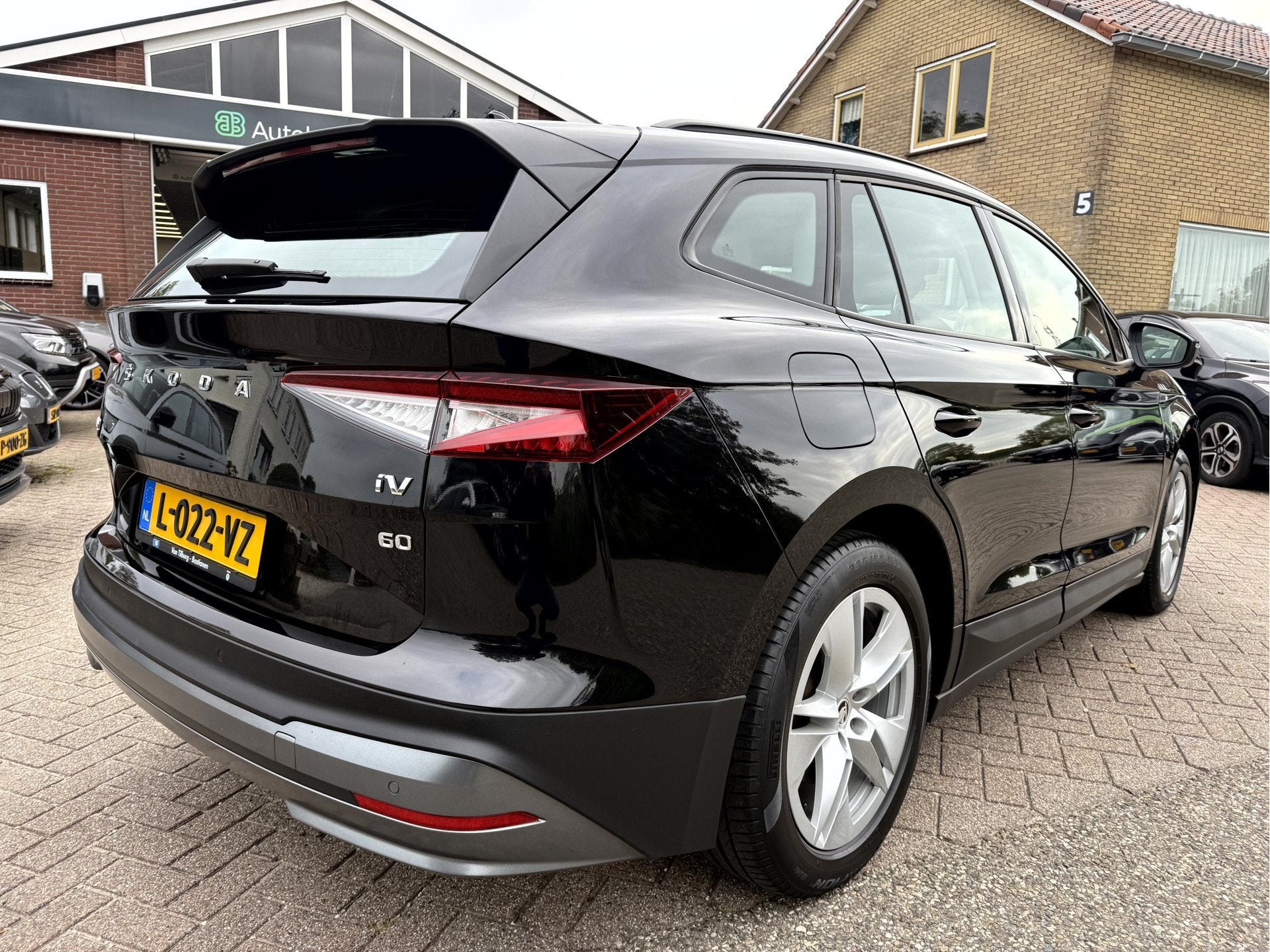 Skoda Enyaq iV 60 SOH 93.7%, Leer, Trekhaak Camera, Auto's, Automaat, 390 km, Achterwielaandrijving, Gebruikt