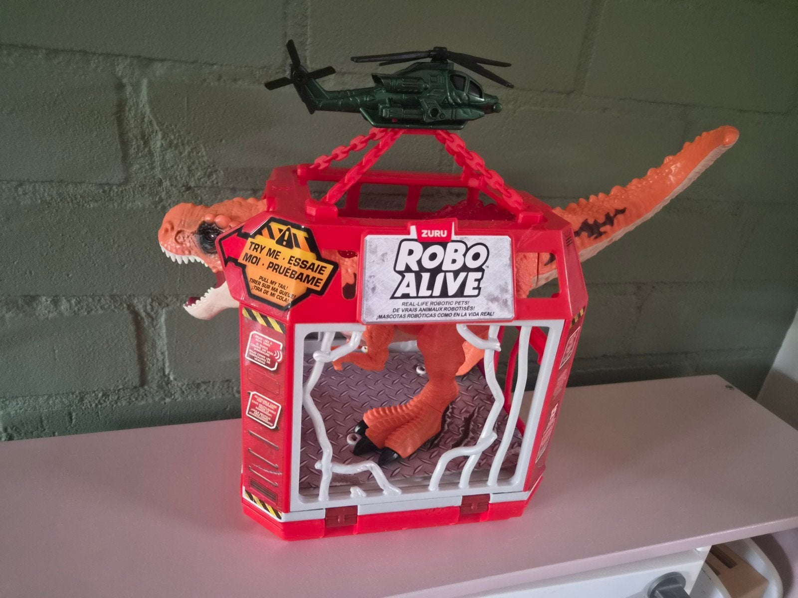 Zuru Robo Alive Interactieve Dino in Kooi met Helikopter, Ophalen of Verzenden, Zo goed als nieuw