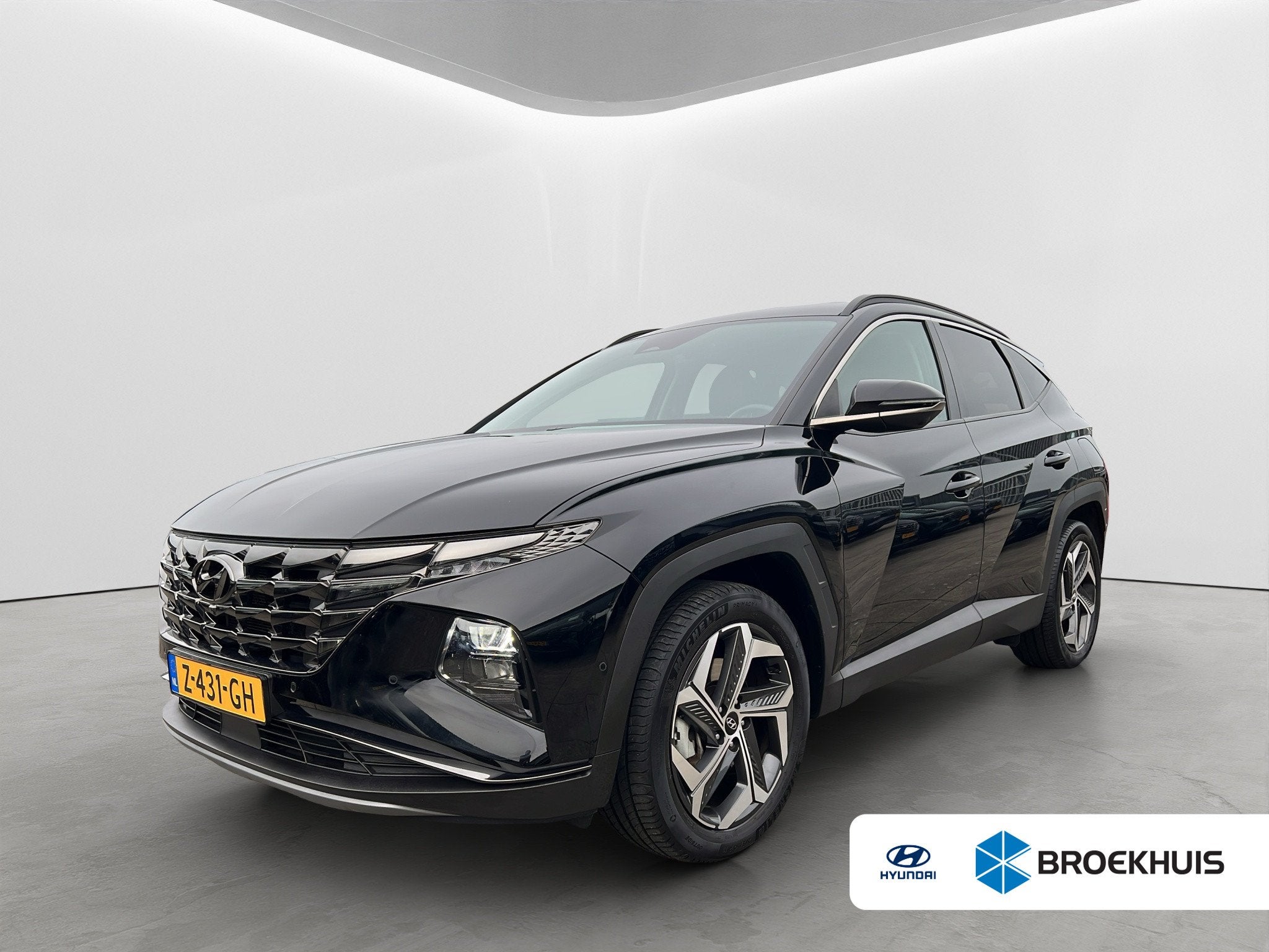 Hyundai Tucson 1.6 T-GDI 265PK PHEV Premium 4WD, Auto's, Hyundai, Gebruikt, 4 cilinders, Zwart, Bedrijf