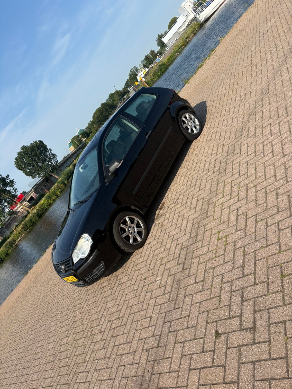 Volkswagen Polo 1.4 55KW 2005 Zwart, Auto's, Voorwielaandrijving, 15 km/l, Zwart, Handgeschakeld