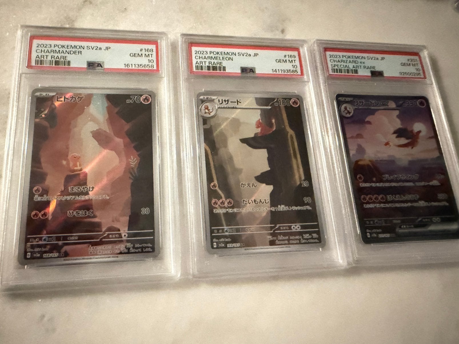 PSA 10 Allen - Charmander, Charmeleon, Charizard ex set, Ophalen, Zo goed als nieuw, Meerdere kaarten