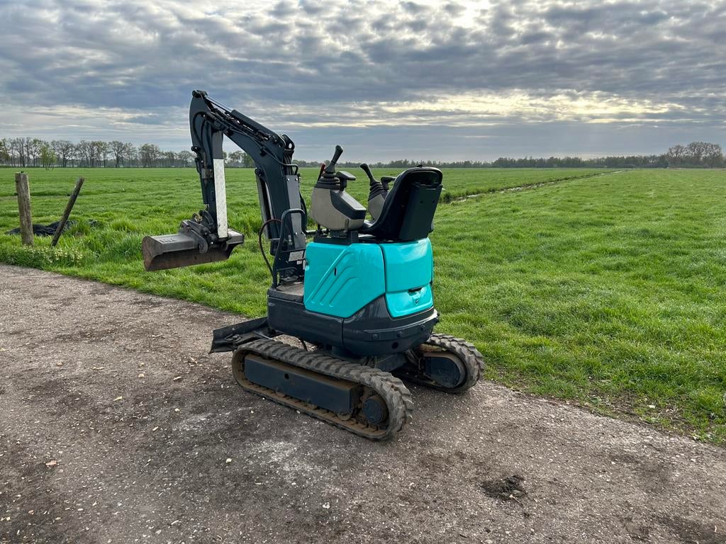 2 stuks New holland kobelco minigraver+ yanmar, Ophalen, Graafmachine