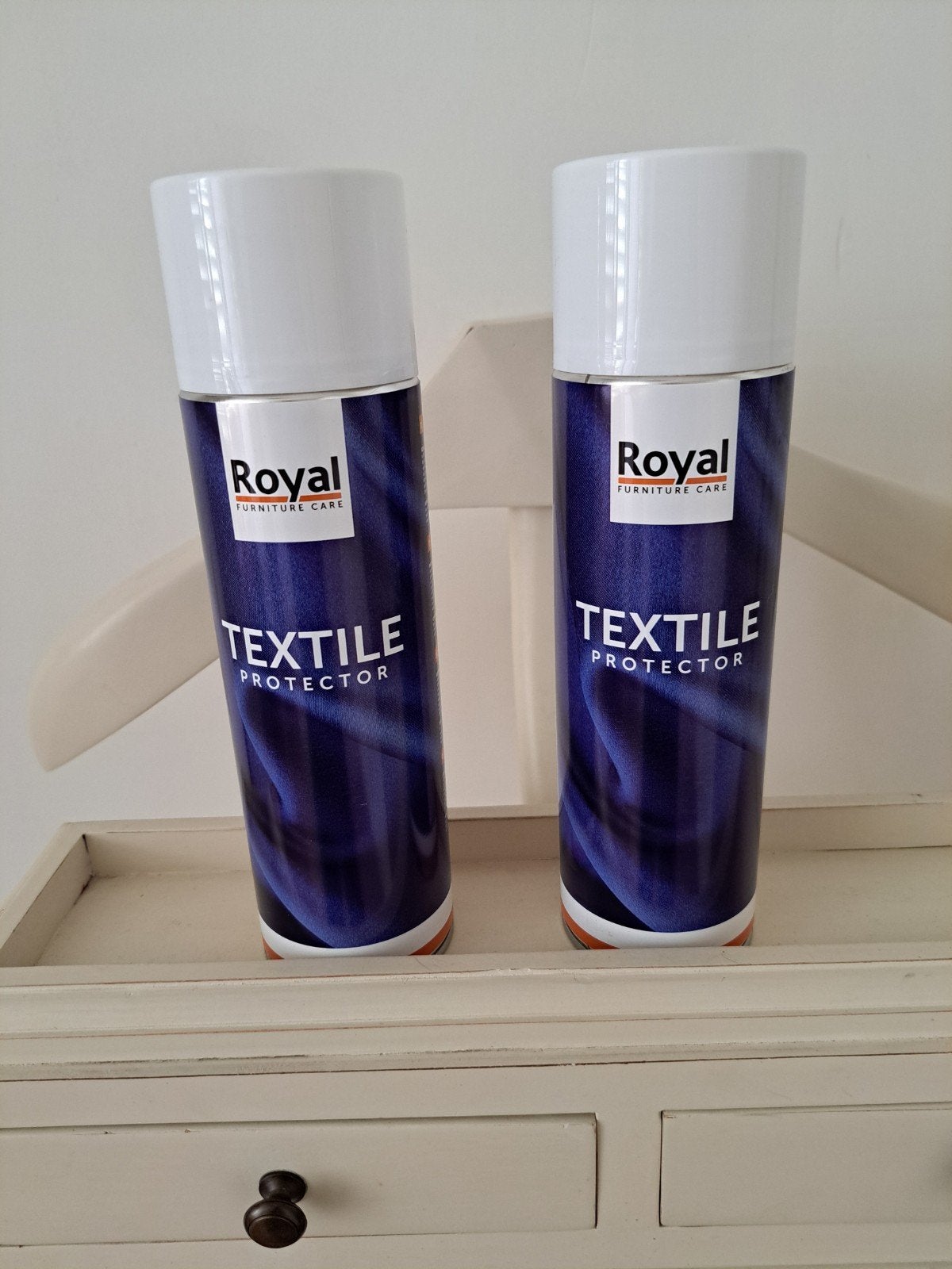 Textiel beschermer, Ophalen