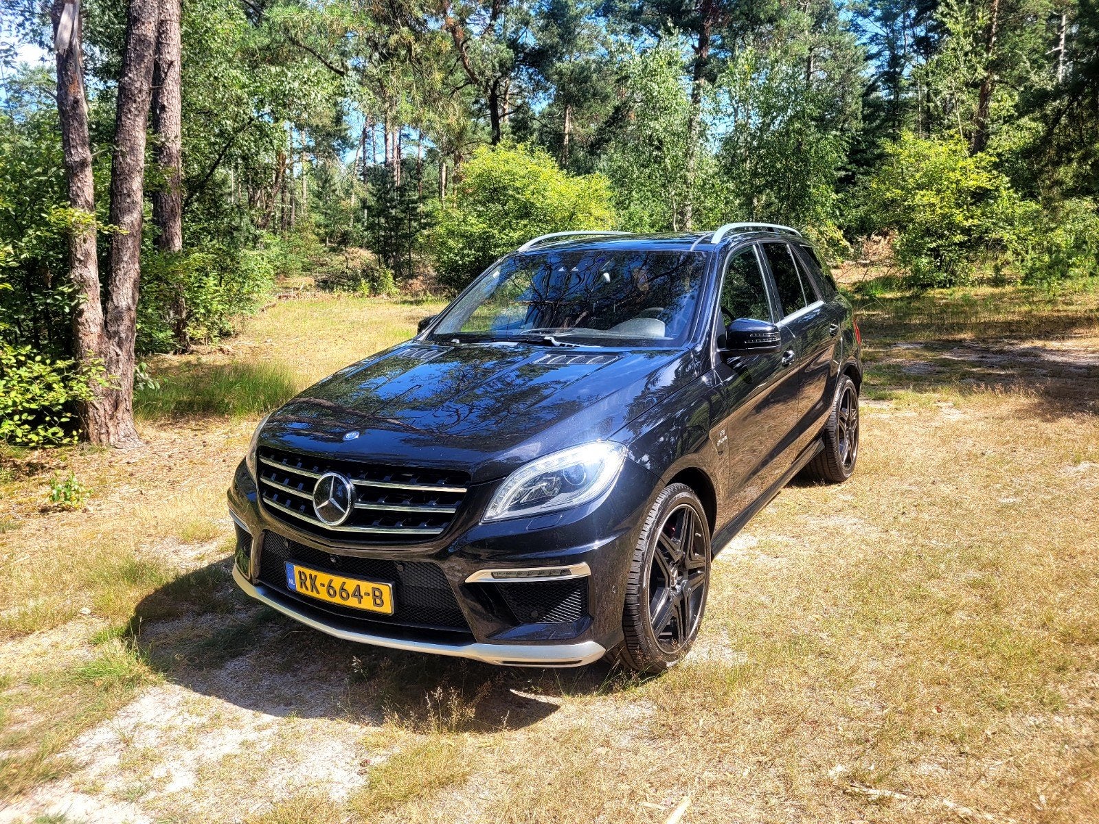 Mercedes-Benz M-Klasse 5.5 Ml63 Performance AUT 2014 Zwart, Auto's, Mercedes-Benz, 5461 cc, 2245 kg, Zwart, 3050 kg