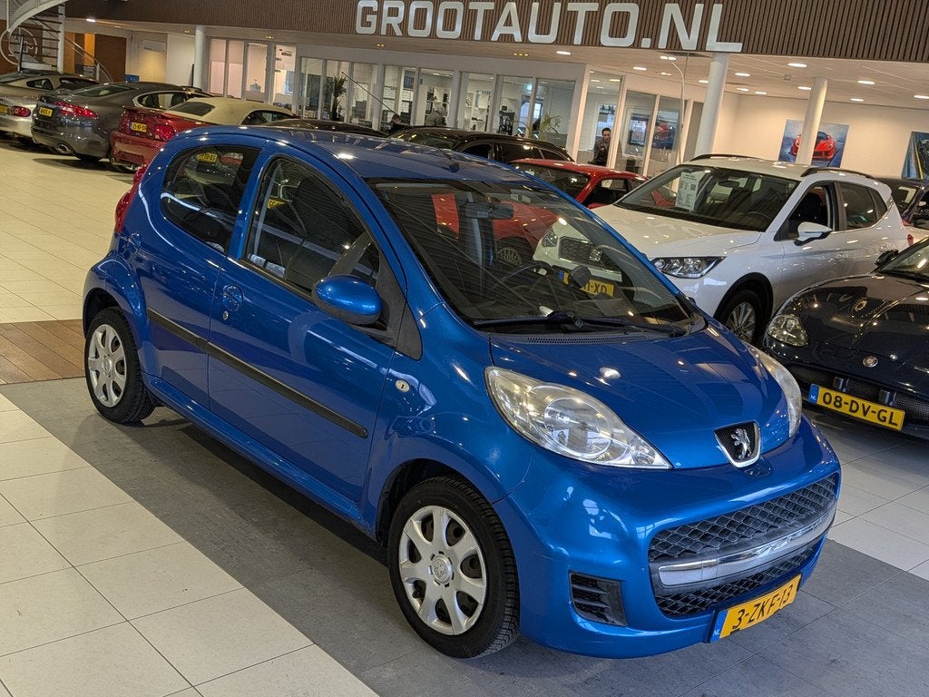 Peugeot 107 1.0-12V Millesim 200 Automaat 5 Deurs, Airco, St, Auto's, Peugeot, Euro 5, Stof, Gebruikt, Zwart