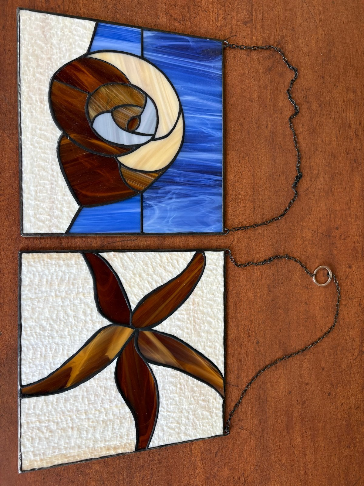 Set van 2 glas-in-lood panelen: schelp en zeester, Ophalen